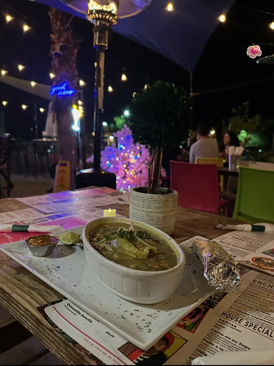 Dinner served on Felipe’s outdoor patio beneath warm evening lights